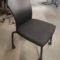 Haworth, Look Stack Chairs, black frame, polyurethane back and upholstered seat-charcoal color. Has casters, no arms